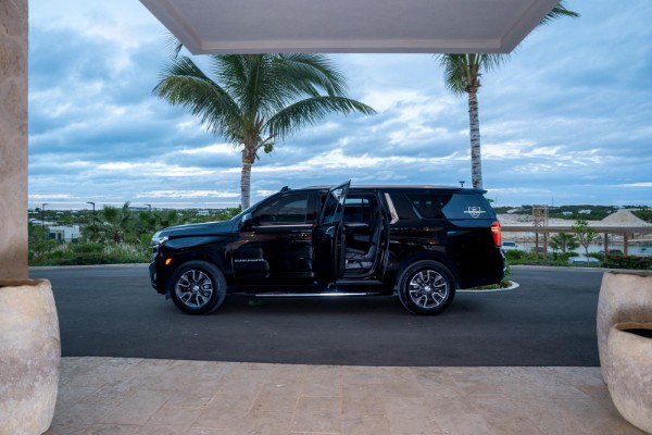 Elite Island Transportation SUV waiting at a resort in Turks and Caicos